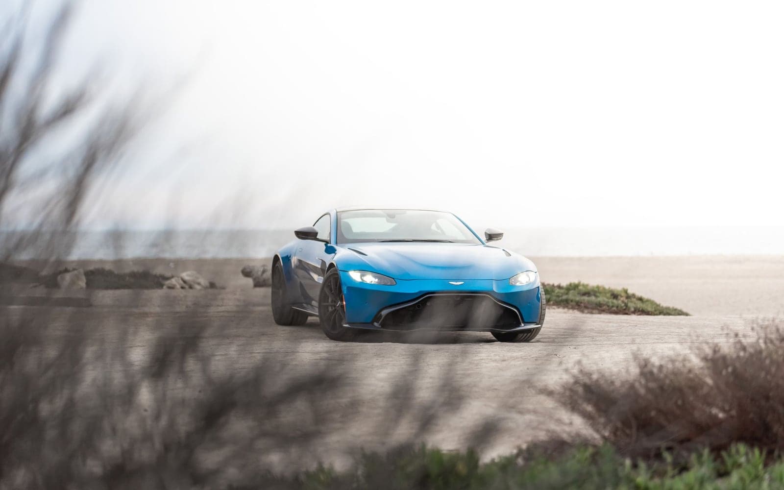 A sports car parked by the sea on the Montenegrin coast
